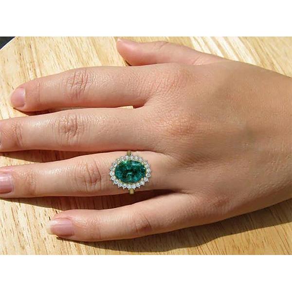 natural round emerald 11ct ring three quarter angle