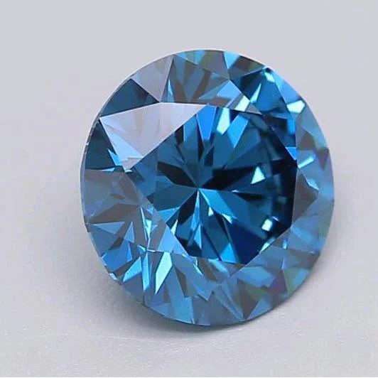 Round Cut Royal Blue Sapphire ring in Gold – front view