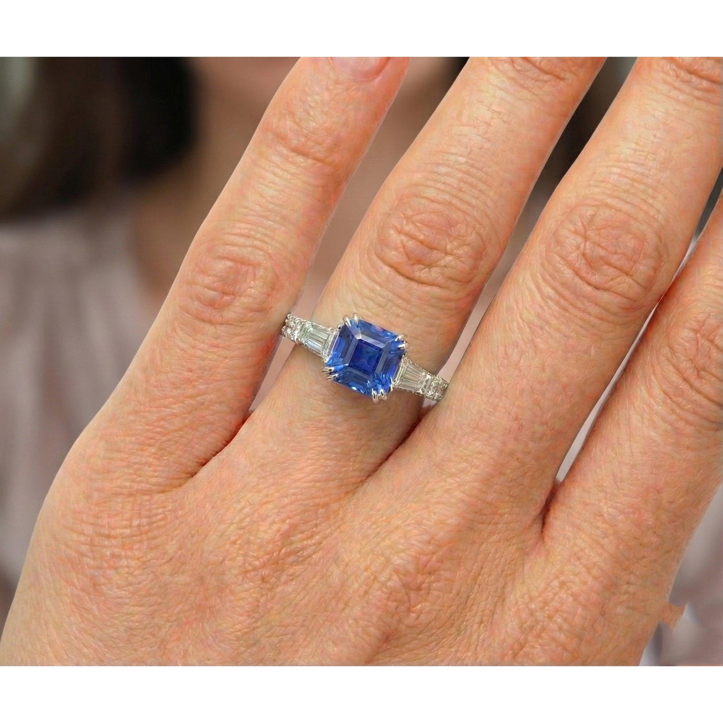 natural round sapphire 3ct ring on white background