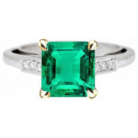 Step Cut Colombian Emerald ring in 14 Karat Two Tone Gold – front view