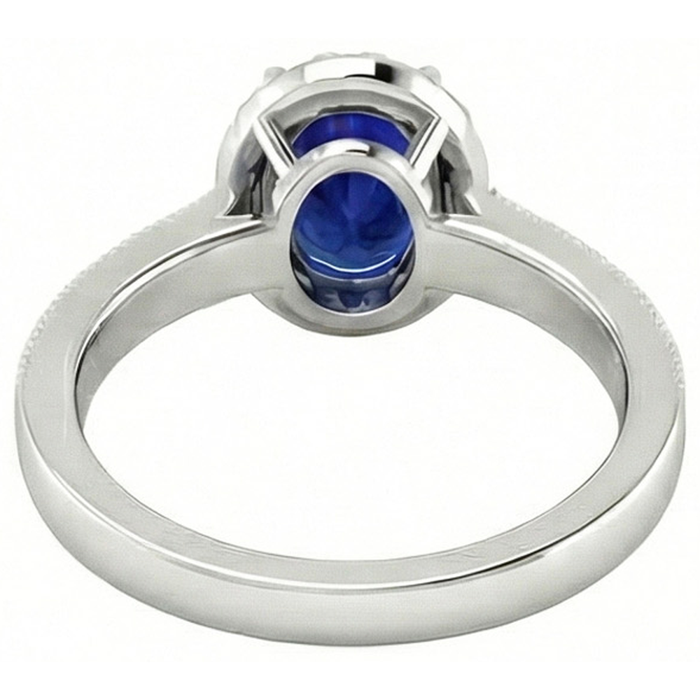 natural round sapphire 4ct ring on white background