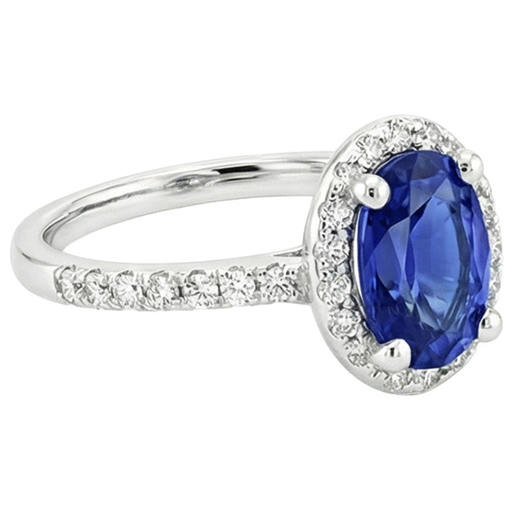 natural round sapphire 3.25ct ring on white background