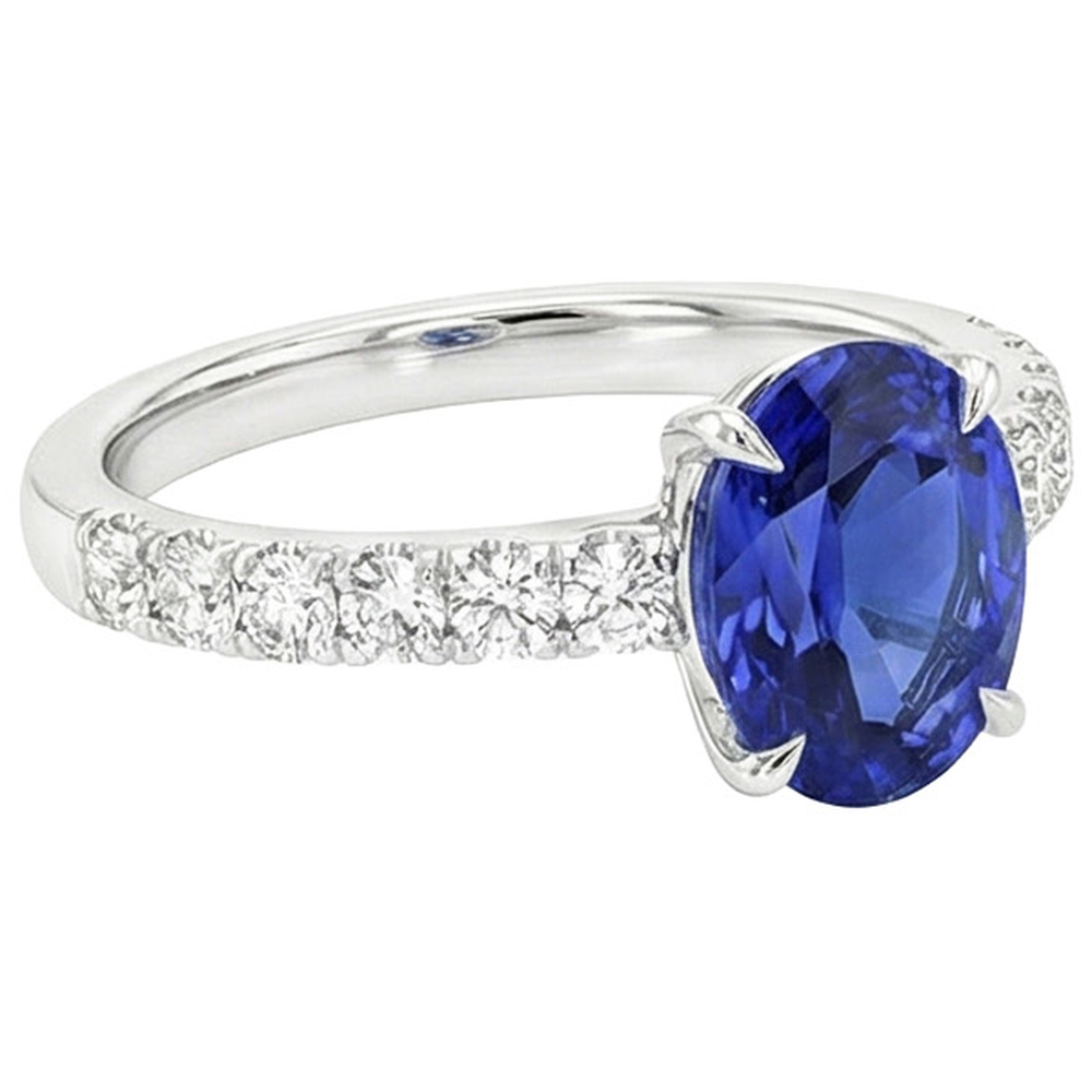 natural round sapphire 4ct ring on white background
