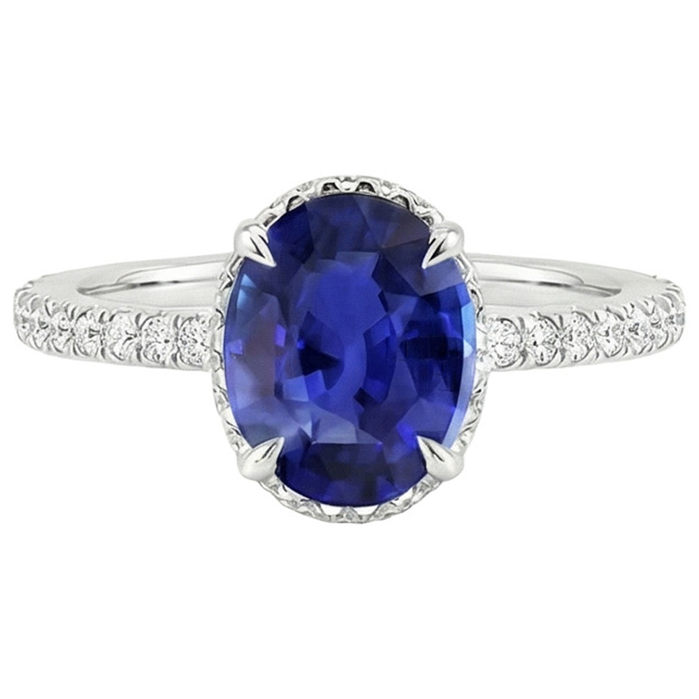 natural round sapphire 4ct ring on white background