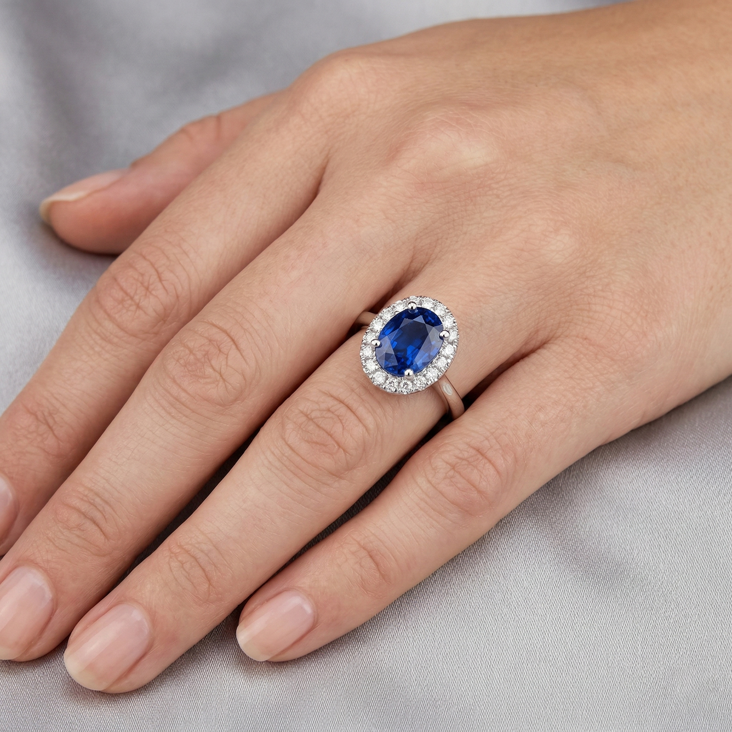 natural round sapphire 5ct ring on white background
