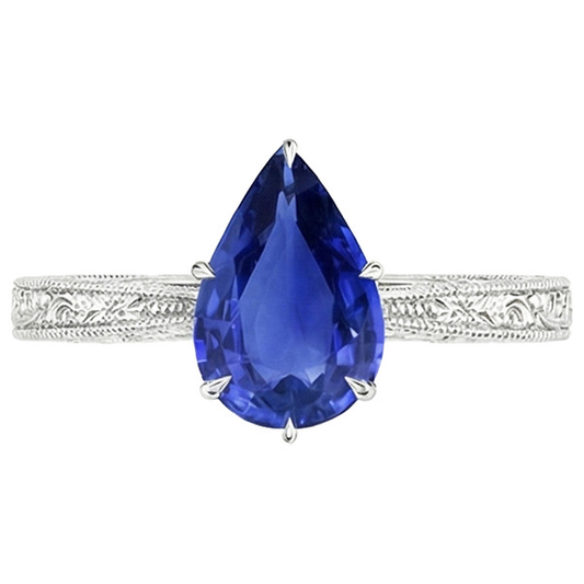 natural pear sapphire 2ct ring profile view
