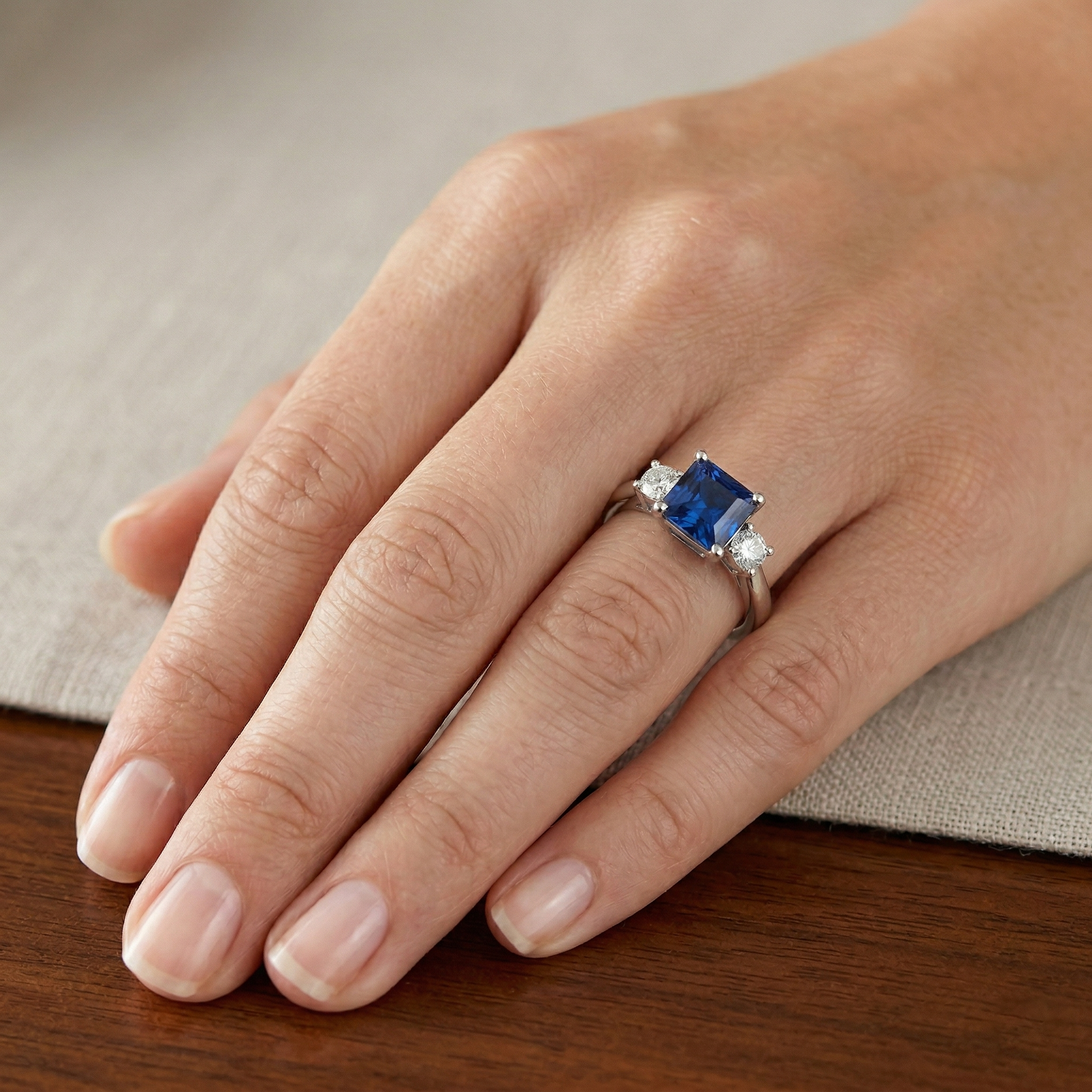 natural round sapphire 1.65ct ring on white background