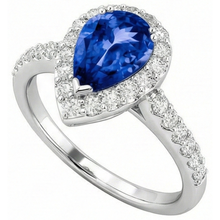 natural round tanzanite 12.25ct ring close up detail