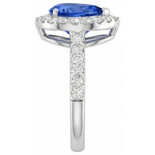 natural round tanzanite 12.25ct ring profile view