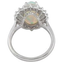 natural round opal 14.25ct ring on white background