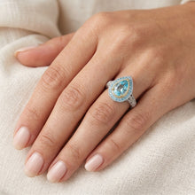 14 Karat Two Tone Gold VVS Clarity Paraiba Tourmaline Halo