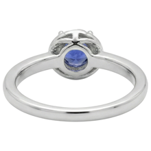 natural round tanzanite 2.25ct ring on white background