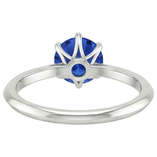 natural round sapphire 2ct ring on white background