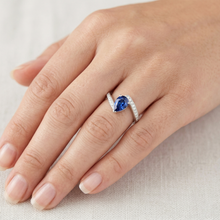 natural round sapphire 2ct ring with diamond accents
