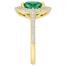 natural round emerald 3.20ct ring on white background