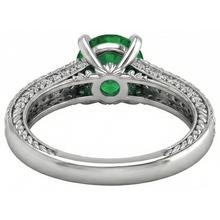 natural round emerald 3.50ct ring on white background