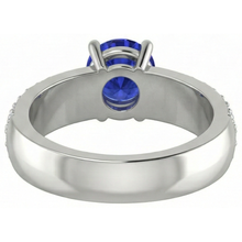 natural round tanzanite 3.70ct ring on white background