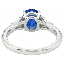 natural round sapphire 3ct ring on white background