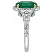 natural round emerald 3ct ring on white background