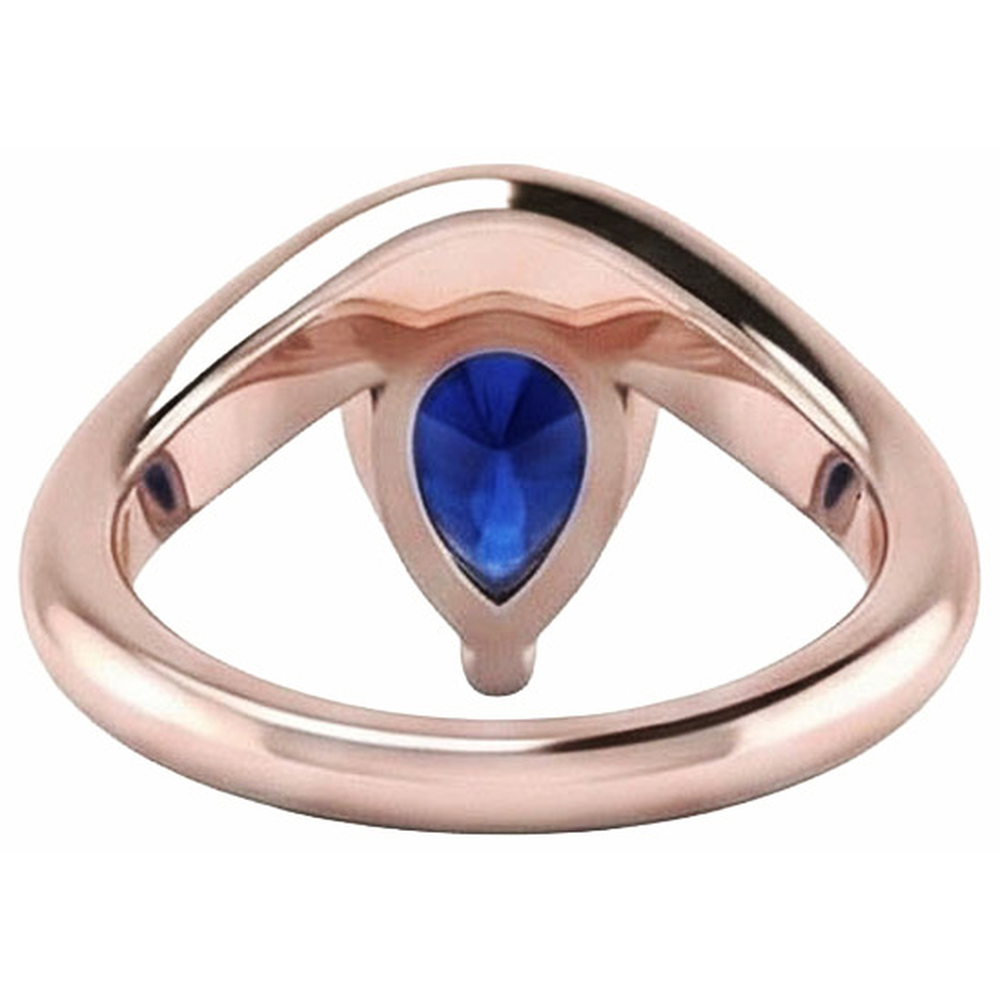 natural pear sapphire 3ct ring on white background