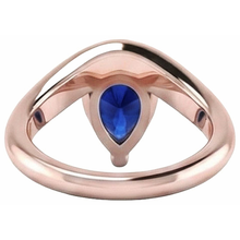 natural pear sapphire 3ct ring on white background