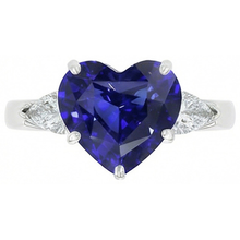 natural pear sapphire 4ct ring on white background