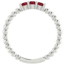 natural round ruby 0.75ct ring on white background