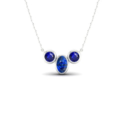 14 Karat White Gold Bezel Set Royal Blue Sapphire Gemstone