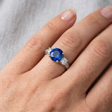 natural round sapphire 2.60ct ring on white background