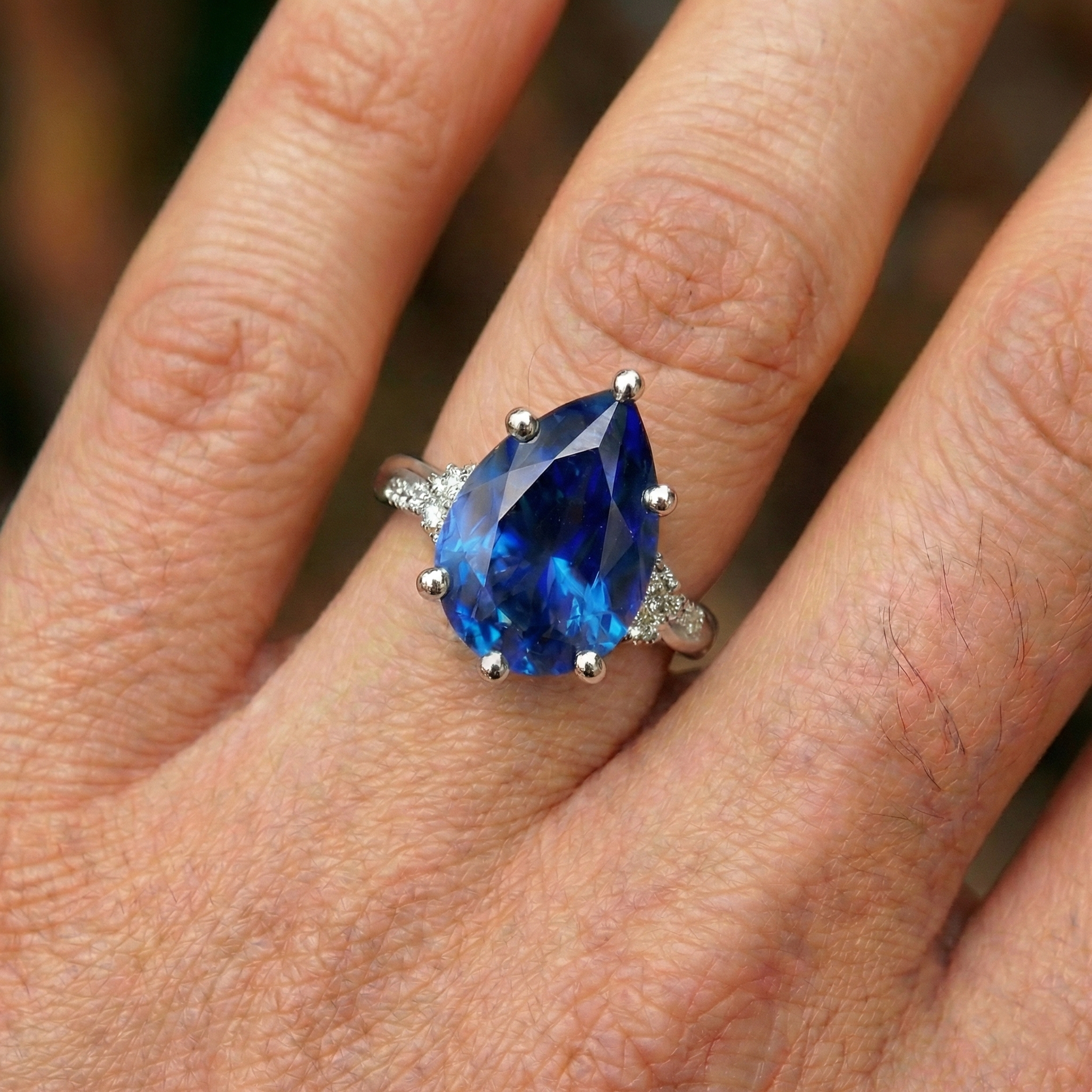 natural round sapphire 6ct ring with diamond accents