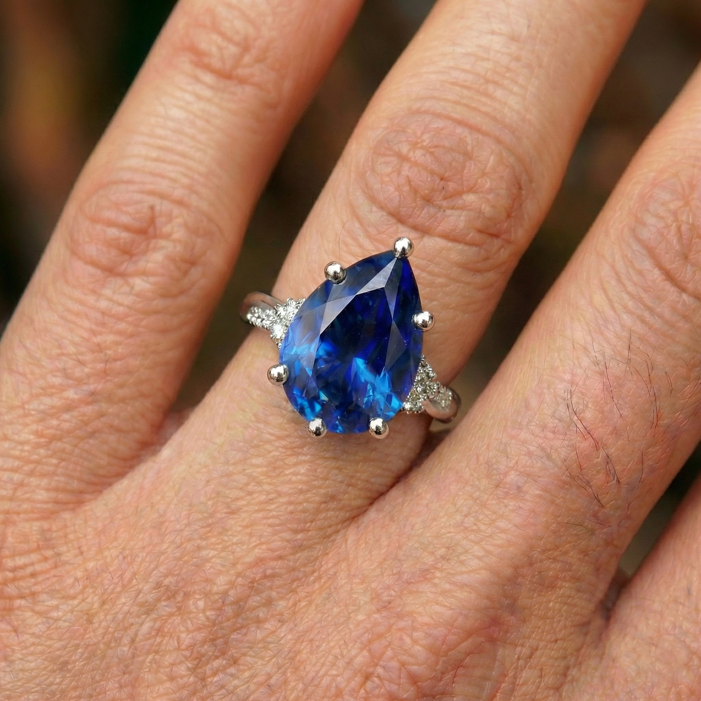 natural round sapphire 6ct ring with diamond accents