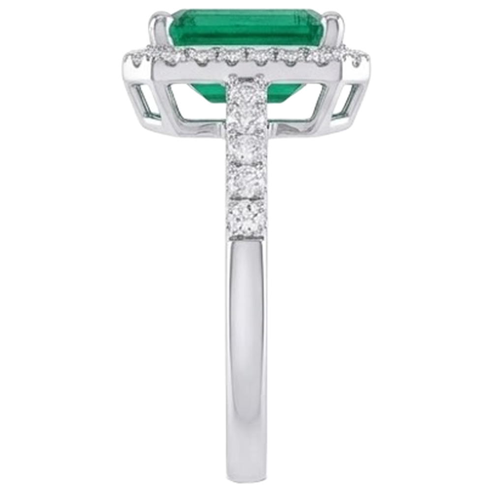 natural round emerald 4.40ct ring on white background