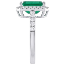 natural round emerald 4.40ct ring on white background