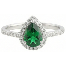 natural round emerald 4.50ct ring side angle