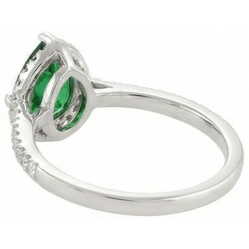 natural round emerald 4.50ct ring on white background