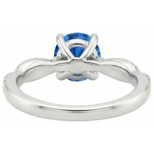 natural round sapphire 4.90ct ring on white background