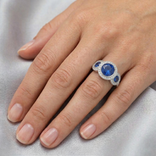 natural round sapphire 4.50ct ring on white background