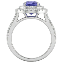 natural round tanzanite 5.25ct ring with diamond accents