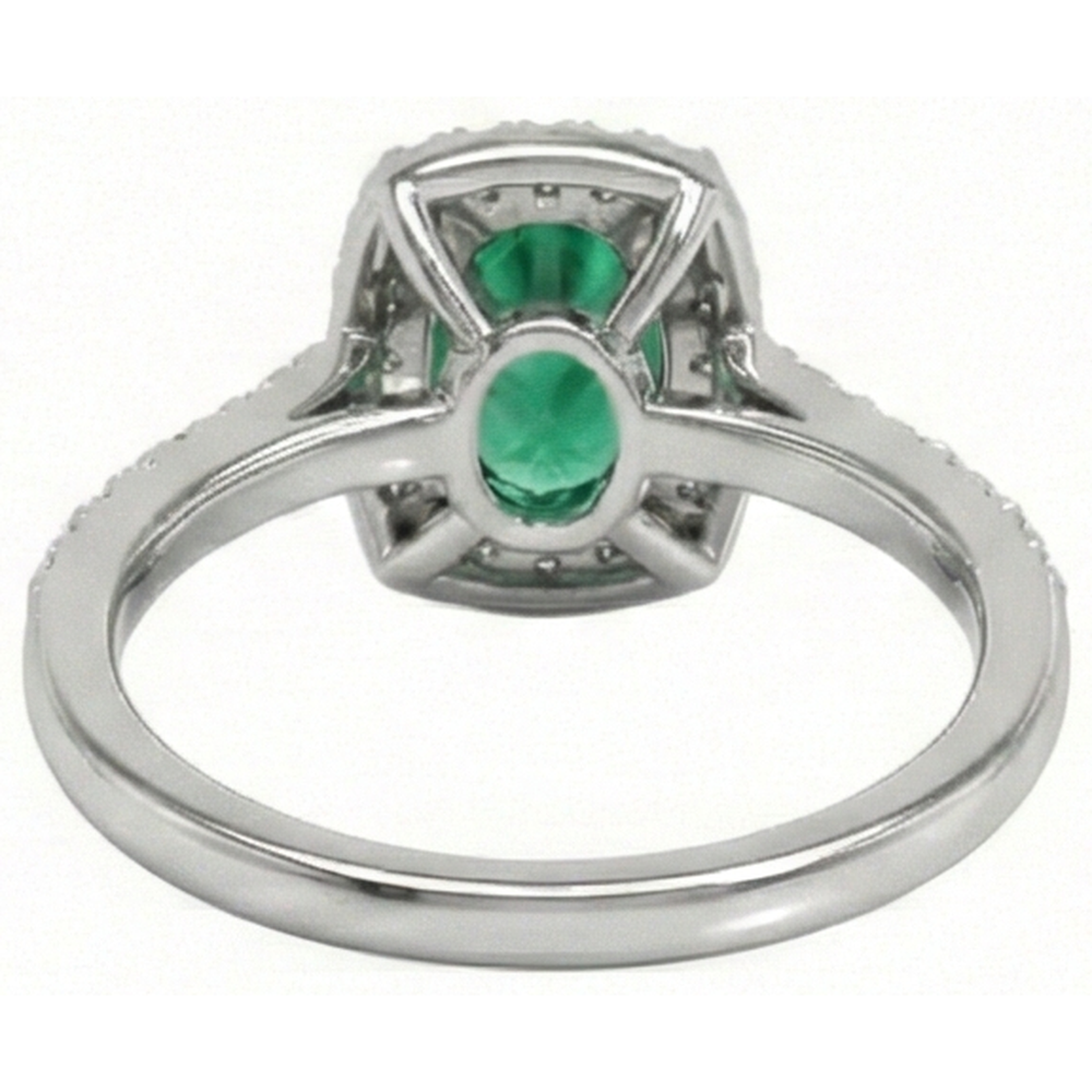 natural round emerald 5.75ct ring on white background