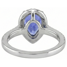 natural round tanzanite 5.75ct ring with diamond accents