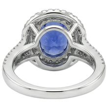 natural round tanzanite 5.90ct ring with diamond accents