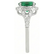 natural round emerald 6.75ct ring profile view