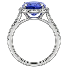 natural round tanzanite 6.85ct ring on white background