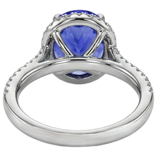 natural round tanzanite 6.85ct ring with diamond accents