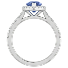 natural round tanzanite 7.25ct ring with diamond accents