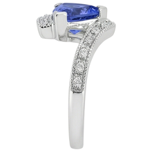 natural round tanzanite 7.25ct ring profile view