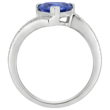natural round tanzanite 7.25ct ring on white background