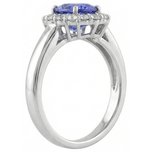 natural round tanzanite 7.50ct ring on white background