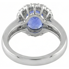 natural round tanzanite 7.50ct ring with diamond accents