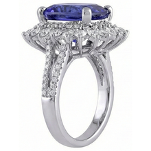 natural round tanzanite 7.75ct ring on white background